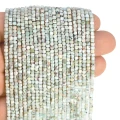 Larimar jasny kostka fasetowana ok. 2,5x2,5mm