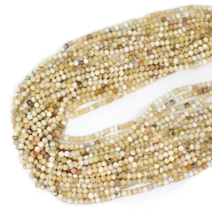 Opal jasny żółty kula fasetowana ok. 4mm