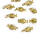 Zawieszka szkielet ryby z cyrkonią ok. 30x10mm [zawieszka, stal, kolor złoty PVD]