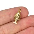Zawieszka szkielet ryby z cyrkonią ok. 30x10mm [zawieszka, stal, kolor złoty PVD]
