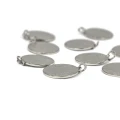 Moneta fakturowana ok. 20x15mm [zawieszka, stal]