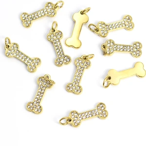 Kość z cyrkoniami ok. 20x7mm  [zawieszka, stal, kolor złoty PVD]