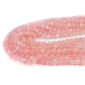 Kwarcyt jasnoróżowy szklisty kula gładka ok. 6,5mm