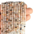 Mix kamieni słoneczny i księżycowy dysk fasetowany ok. 4x3mm