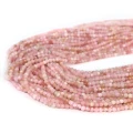 Opal pastelowo różowy kula fasetowana ok. 2mm
