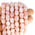 Opal różowy bryła nieregularna gładka ok. 14x8mm