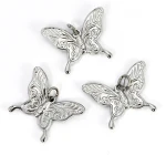Motyl ok. 24x19mm [zawieszka, stal]