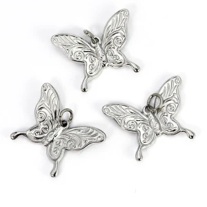 Motyl ok. 24x19mm [zawieszka, stal]