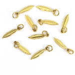 Pióro ok. 19x4mm [zawieszka, stal, kolor złoty PVD]