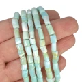 Opal błękitny walec nieregularny ok. 5-6x6-8mm