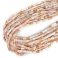 Opal beżowo różowy walec nieregularny ok. 5-6x6-8mm