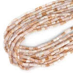 Opal beżowo różowy walec nieregularny ok. 5-6x6-8mm