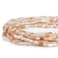 Opal beżowo różowy walec nieregularny ok. 5-6x6-8mm