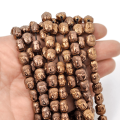 Budda hematyt miedziany 10x8,5x7mm [sznur 40cm]