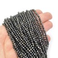 Spinel grafitowy kula fasetowana ok. 3mm [sznur 31 cm]