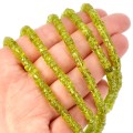 Oliwin nieregularny talarek ok. 4,5-5x2-3mm