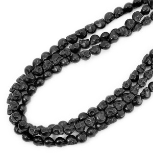 Howlit syntetyczny czarny czaszka ok. 10x13mm 