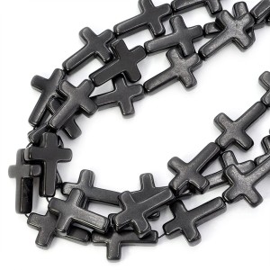 Howlit syntetyczny czarny krzyż ok. 24x18mm 