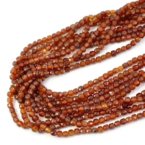 Granat rudy kostka fasetowana ok. 4x4mm