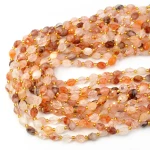 Lepidolit czerwony z kwarcem oliwka fasetowana ok. 8x7mm