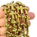 Hematyt złoty wypukły krzyż ok. 14x10mm