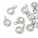 Okrąg z serduszkiem ok. 13x8mm [zawieszka, stal]