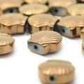 Hematyt miedziany muszelka ok. 8x9mm [przekładka]