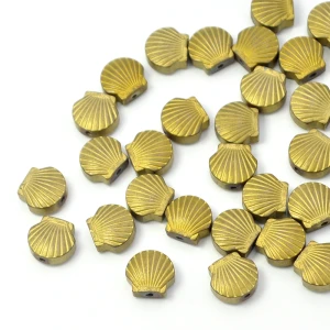 Hematyt ciemne złoto muszelka ok. 8x9mm [przekładka]