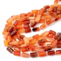 Agat karneol cieniowany walec nieregularny ok. 11-14x6-9mm