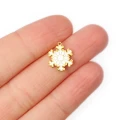Świąteczna śnieżynka ok. 13x11,5mm [zawieszka, stal, kolor złoty PVD]