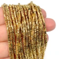 Hematyt miodowe złoto heishi ok. 2x1mm [obłe rogi]