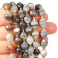 Agat botswana oliwka fasetowana ok. 10x8mm