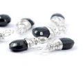 Turmalin czarny brioletka w oprawie srebrnej ok. 10-12x4-5mm