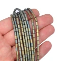 Hematyt zielono złoty matowy walec ok. 3x5mm