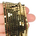 Hematyt jasne złoto kostka ok. 3x3mm