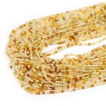 Opal żółty cieniowany kula fasetowana ok. 2,5mm