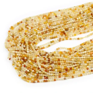 Opal żółty cieniowany kula fasetowana ok. 2,5mm