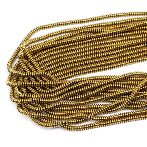Kamienie w formie drobnych oponek hematytu w kolorze złotym, w rozmiarze ok. 3x1mm.