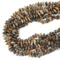 Kamień słoneczny ciemny płaska bryłka nieregularna ok. 8-13x2-6mm
