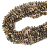 Kamień słoneczny ciemny płaska bryłka nieregularna ok. 8-13x2-6mm