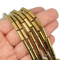 Hematyt jasne złoto walec ok. 13x4mm