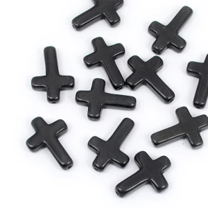 Howlit krzyż czarny ok. 25x18mm [przekładka]