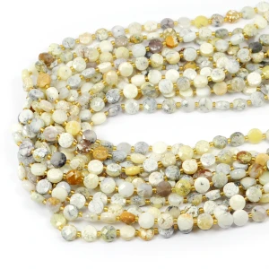 Opal blady żółty moneta fasetowana ok. 6,5mm