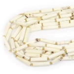 Howlit kremowy walec nieregularny szlifowany ok. 15-30x6-7mm