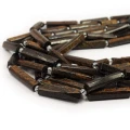 Bronzyt walec nieregularny szlifowany ok. 12-30x6-7mm