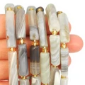 Agat szary walec nieregularny szlifowany ok. 20-30x6-7mm