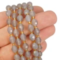 Agat szary oliwka fasetowana ok. 8x6,5mm