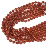 Agat karneol kula grubo fasetowana ok. 7mm