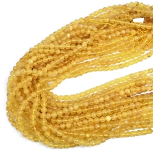 Bursztyn mleczno-żółty kula gładka ok. 5,5mm
