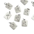 Zawieszka blaszka z wyciętym dmuchawcem ok. 17,5x10,5mm [zawieszka, stal]